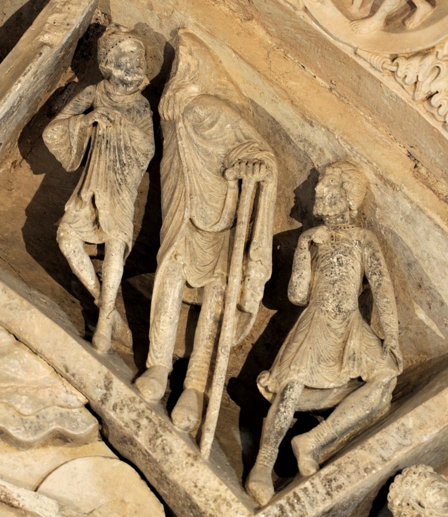 Vézelay - Abbatiale - Tympan central - caisson : un Phrygien et des malades (v. 1130)